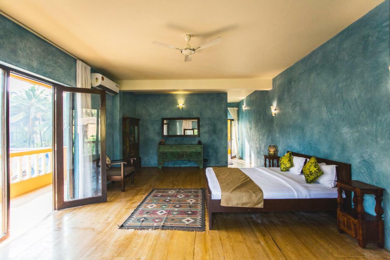 Devarya Wellness Beach Resort Morjim Habitación foto