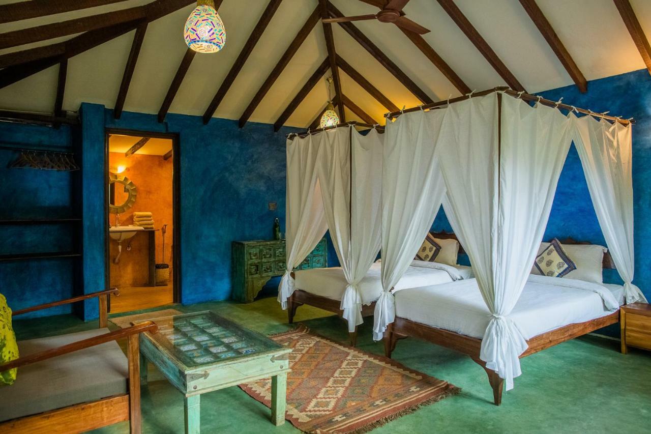 Devarya Wellness Beach Resort Morjim Habitación foto